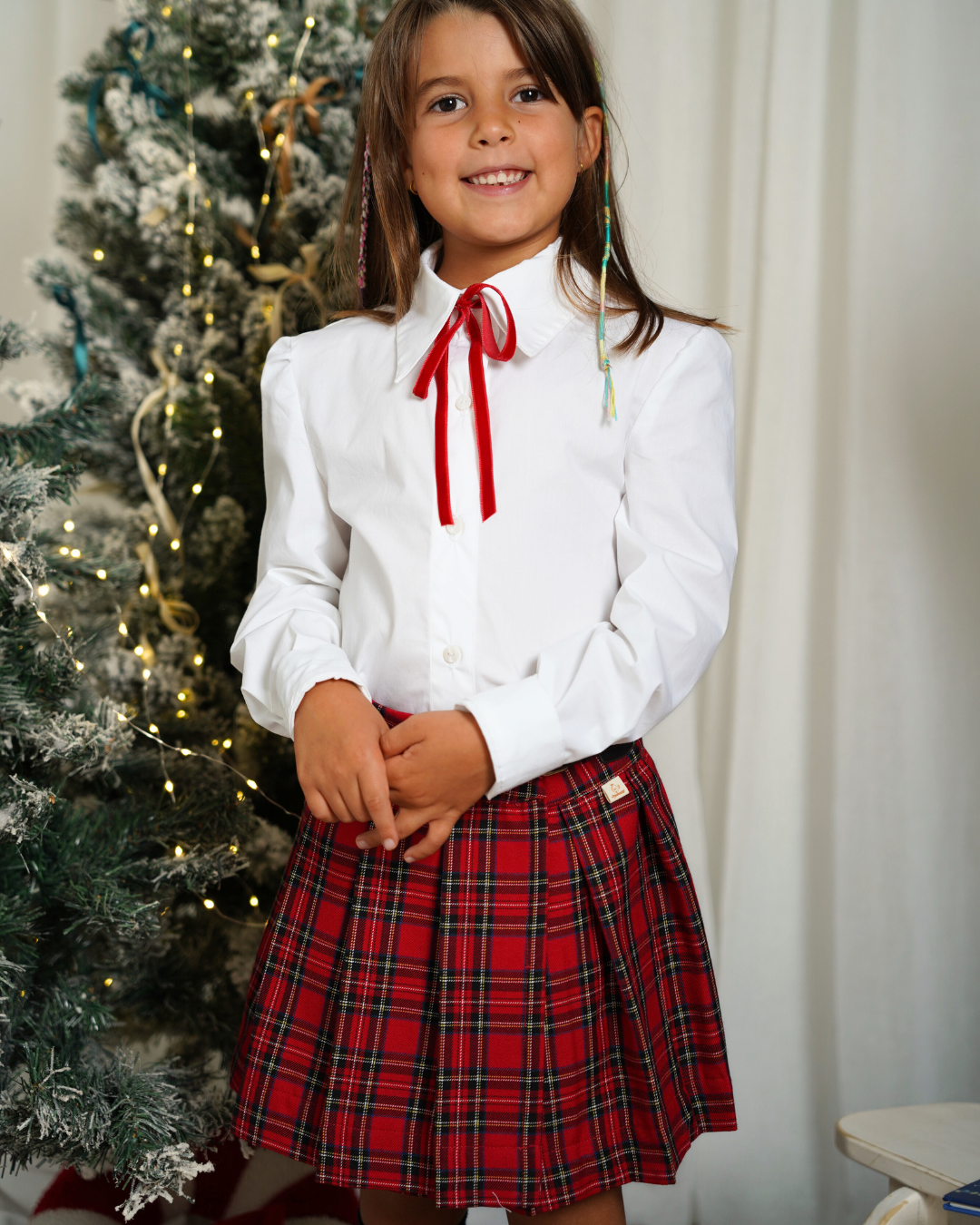 Saia de tartan com folhos e detalhe em couro