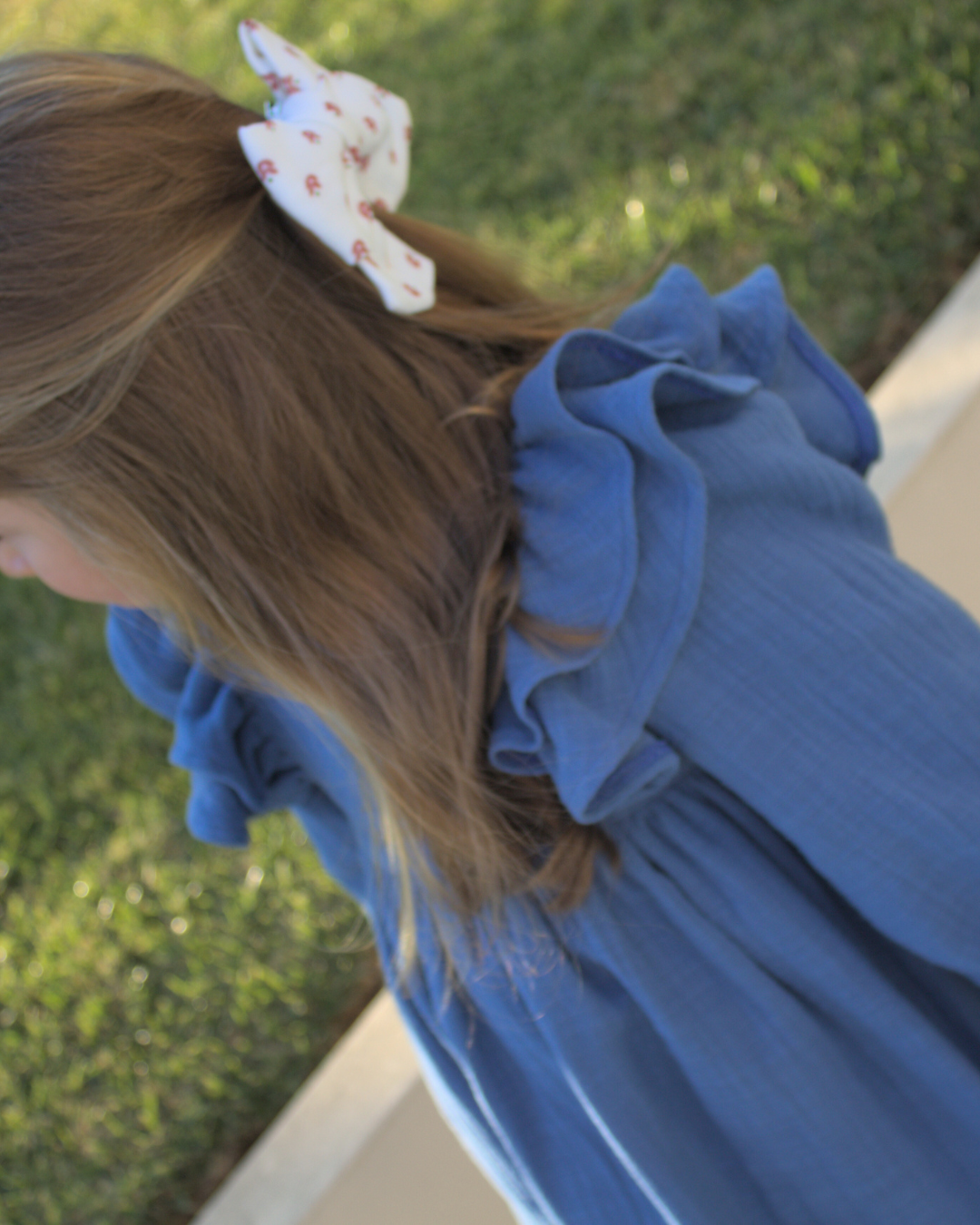 Vestido em musselina com folhos