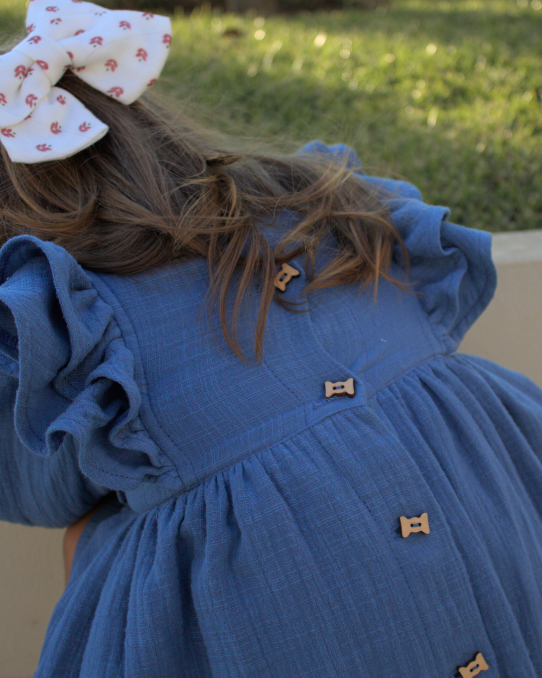 Vestido em musselina com folhos