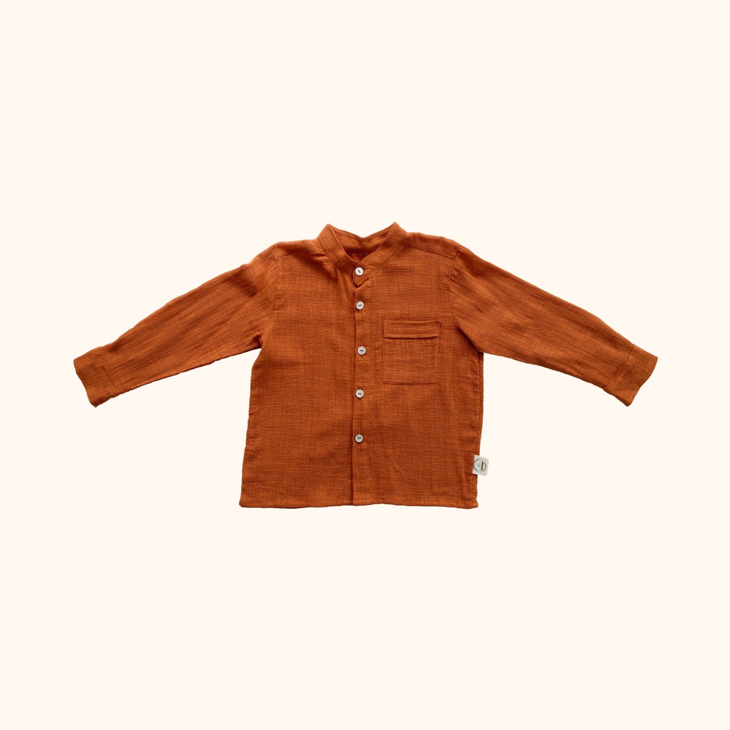 Camisa de menino em musselina alinhada