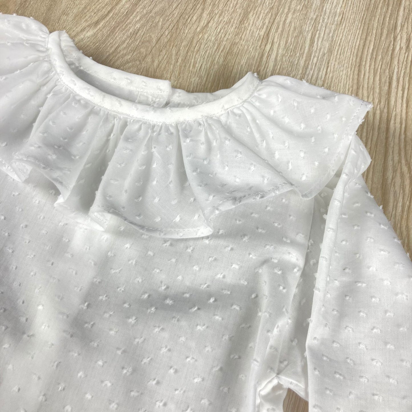 Blusa de menina em plumeti