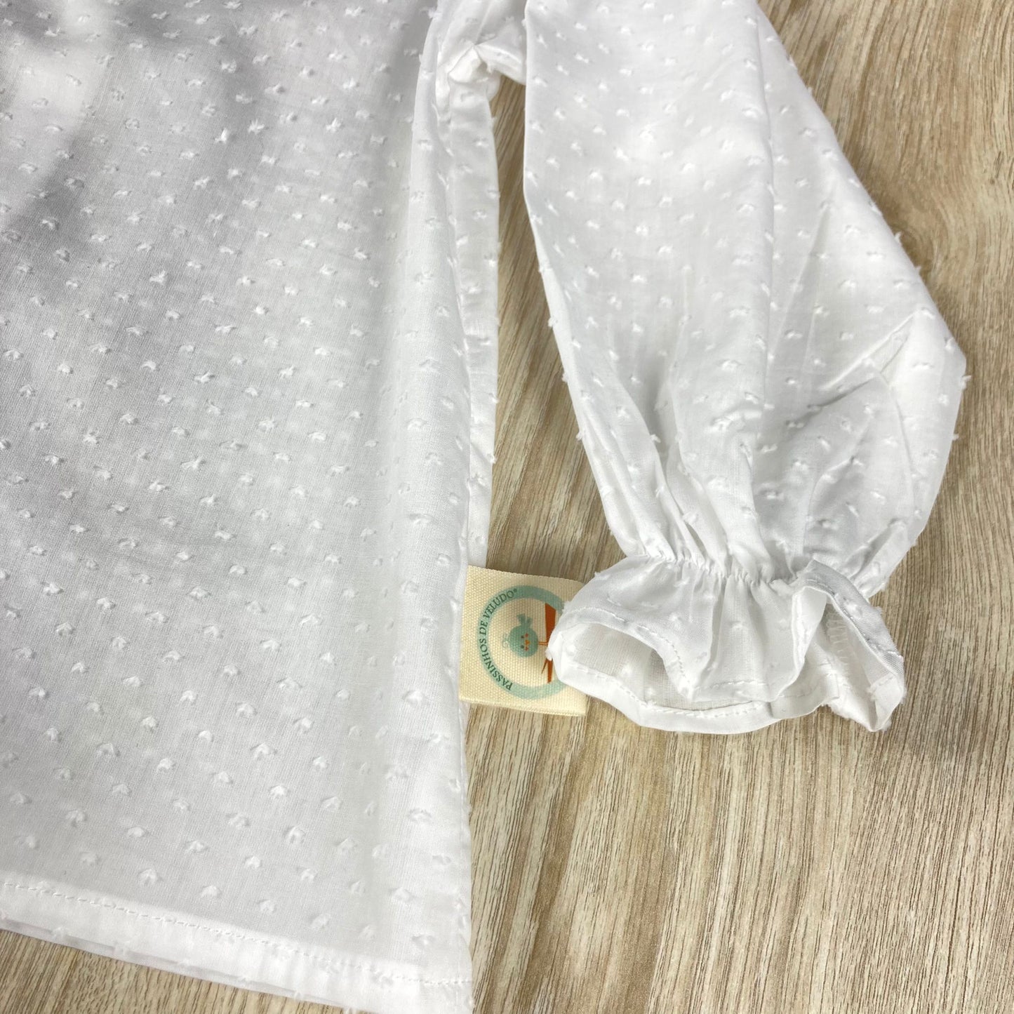 Blusa de menina em plumeti