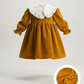 Vestido de veludo com gola amovível