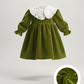 Vestido de veludo com gola amovível